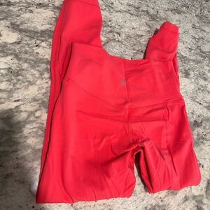 Women bright pink lulu align